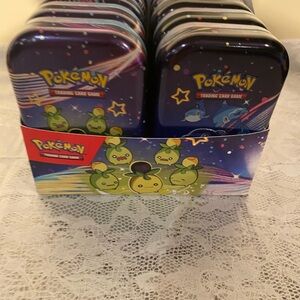 10 Mini Pokémon Tins in box (No Cards)